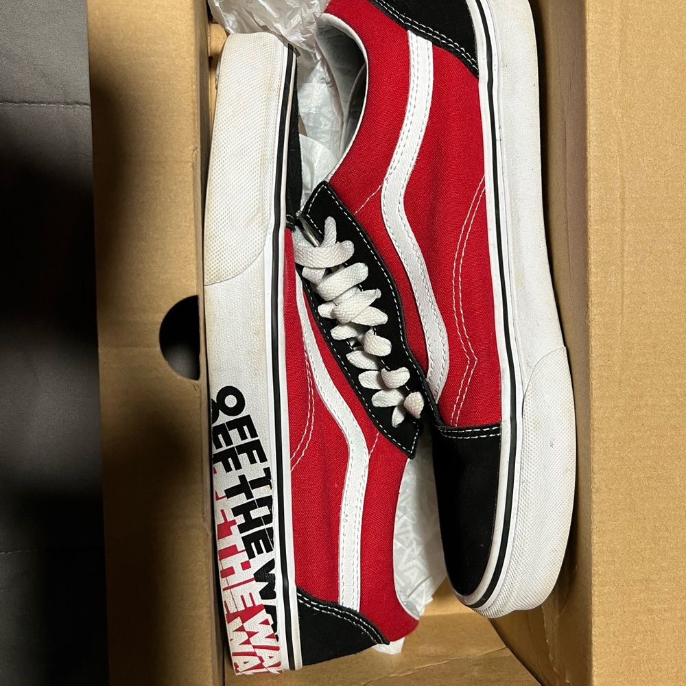 Off the wall racing red vans